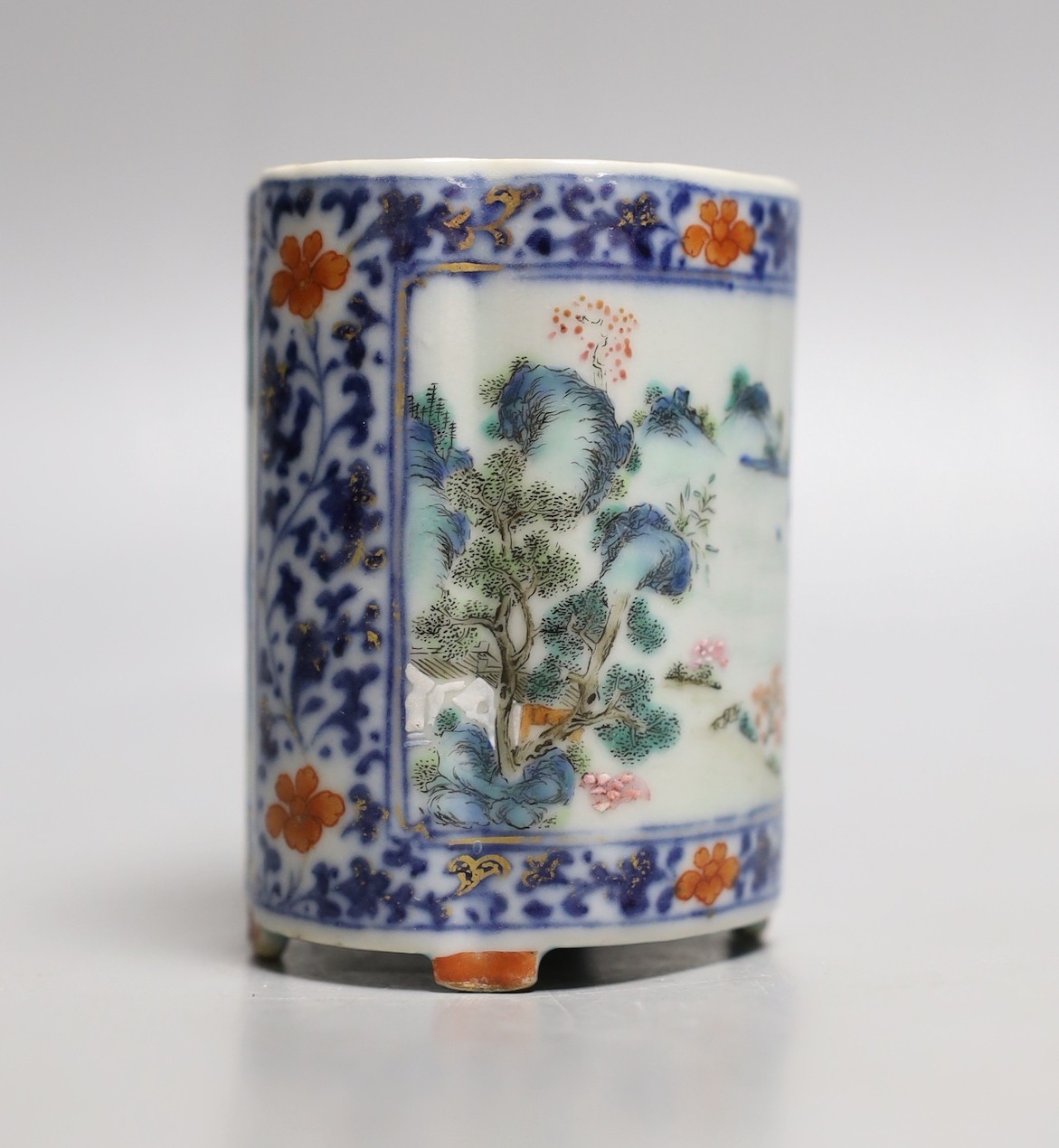 A Chinese famille rose fencai brush pot, Qianlong seal mark but 19th century, 8.1 cm high, wear to gilding